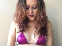 Sexy Brunette with Perky Tits Smoking White Filter 100 in Pink Bikini Top Thumb